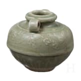 A small Chinese molded Longquan celadon vase, probably Ming Dynasty