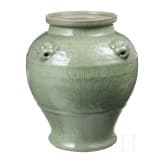 A Chinese molded Longquan celadon jar, probably Yuan Dynasty