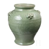 A Chinese molded Longquan celadon jar, probably Yuan Dynasty