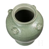 A Chinese molded Longquan celadon jar, probably Yuan Dynasty