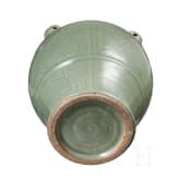 A Chinese molded Longquan celadon jar, probably Yuan Dynasty