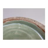 A Chinese molded Longquan celadon jar, probably Yuan Dynasty