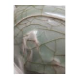 A molded Longquan celadon vase, probably Ming Dynasty