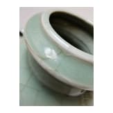 A molded Longquan celadon vase, probably Ming Dynasty