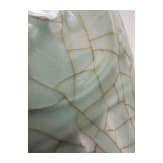 A molded Longquan celadon vase, probably Ming Dynasty