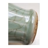A molded Longquan celadon vase, probably Ming Dynasty
