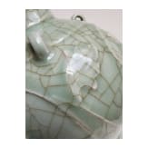 A molded Longquan celadon vase, probably Ming Dynasty