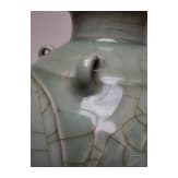 A molded Longquan celadon vase, probably Ming Dynasty