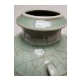 A molded Longquan celadon vase, probably Ming Dynasty