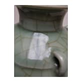 A molded Longquan celadon vase, probably Ming Dynasty
