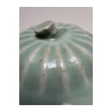 A Chinese Longquan-celadon lotus jar, probably Ming Dynasty