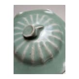 A Chinese Longquan-celadon lotus jar, probably Ming Dynasty