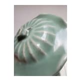 A Chinese Longquan-celadon lotus jar, probably Ming Dynasty