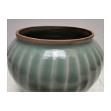 A Chinese Longquan-celadon lotus jar, probably Ming Dynasty