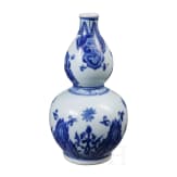 A Chinese blue and white double-gourd porcelain vase with flowers, probably Kangxi period