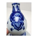 A Chinese blue and white double-gourd porcelain vase with flowers, probably Kangxi period