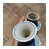 Five small Chinese blue and white "Vung Tau" cargo vases with covers, probably Kangxi period