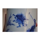 A Chinese blue and white brush pot showing a scholar in landscape, probably Kangxi period (18th century)