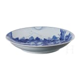 A Chinese blue and white porcelain charger with river and mountain scene, probably 19th/20th century