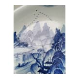 A Chinese blue and white porcelain charger with river and mountain scene, probably 19th/20th century