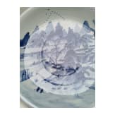 A Chinese blue and white porcelain charger with river and mountain scene, probably 19th/20th century