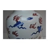 A large Chinese blue and white and copper red dragon vase with Chengua six-character mark, 20th century