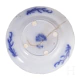 Two Chinese plates and a four-piece storage vessel