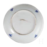 Two Chinese plates and a four-piece storage vessel