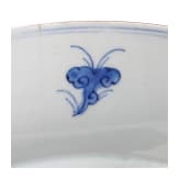 Two Chinese plates and a four-piece storage vessel