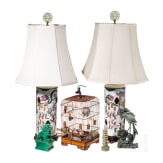 A pair of Chinese famille rose table lamps, a bird cage, a guardian lion, a F&egrave;nghu&aacute;ng and a pagoda, 20th century