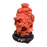 A carved Chinese figural coral flask, 20th century
