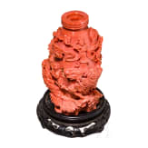 A carved Chinese figural coral flask, 20th century
