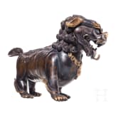 A Chinese bronze of a striding guardian lion, circa 1900