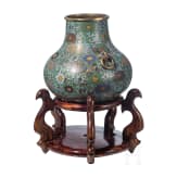 A large Chinese lotus patterned cloisonn&eacute; jar with wooden stand, 20th century