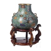 A large Chinese lotus patterned cloisonn&eacute; jar with wooden stand, 20th century