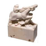 A Japanese marble Netuske carving of a monkey on a horse, probably 1900