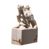 A Japanese marble Netuske carving of a monkey on a horse, probably 1900