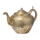 An embossed Persian copper tea pot (jug), Qajar period, circa 1800