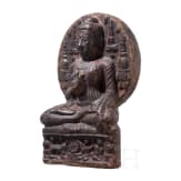 An Indian terracotta figure of a seated Buddha, probably 18th century