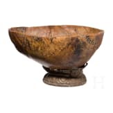 A Tibetan kapala skull bowl on metal stand, 19th century