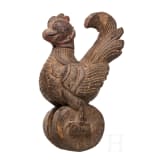 Four mainly Javanese masks and an Indonesian carved wooden chicken, 20th century