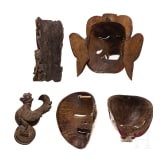 Four mainly Javanese masks and an Indonesian carved wooden chicken, 20th century