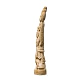 An ivory figure showing a woman with fruits, probably Indian, circa 1900