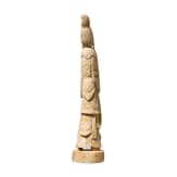 An ivory figure showing a woman with fruits, probably Indian, circa 1900