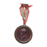 A French turned wood relief with profile of Emperor Vespasian, 18th century