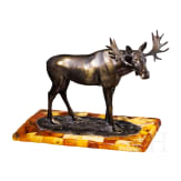 A bronze elk figure on an amber stand, Hendrik Scholter, circa 1930