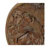 A carved Franconian oak panel showing St. Francis, 18th century