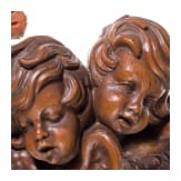 An Italian bozzetto of a lute player and carved angel heads, probably 19th century