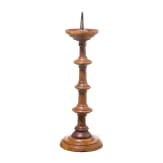 A German turned wood disc candlestick, 16th/17th century