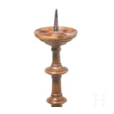 A German turned wood disc candlestick, 16th/17th century